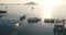 Yacht, sailboats at pier aerial. Passenger ship docked at harbor. Tourist marine travel at open sea