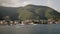 The yacht is sailing in the Adriatic Sea in Montenegro against the backdrop of beautiful mountains