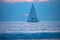 Yacht sailing against sunset. Landscape with skyline sailboat and sunset silhouette. Yachting tourism. Romantic trip on