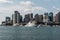 Yacht and sailing boats on Charles River in front of Boston Skyline in Massachusetts USA on a sunny summer day