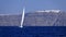 Yacht sailing off Santorini island