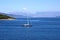 Yacht sailing on the sea. Ionian sea. Sea and mountain view