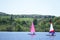 Yacht sailing in summer lake colourful sail blown in wind