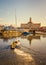 Yacht sailing to its mooring in Ramsgate Royal harbour, the historic listed building of the clock house and tower can be seen.