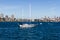 Yacht sailing under power in Sydney Harbour