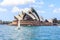 A yacht sails past the Opera House