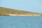 A yacht in the sea with Lambay Island in the Irish Sea. Landscapes of Ireland.