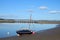 Yacht on shore River Kent estuary, Arnside