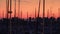 Yacht silhouette on background evening city. Landscape yacht port and boat mast