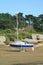 Yacht standing on sand