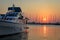 Yacht at sunrise at Mandraki harbor