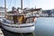 Yacht in the Vieux Bassin or old port at medieval city Honfleur. Normandy, France