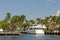 Yacht in water and palm trees