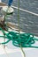 Yachting, green rope on deck of sailboat, details of yacht