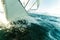 Yachting on sail boat bow stern shot splashing water