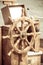 Yachting. Ship wooden steering wheel. Sailboat detail.