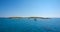 Yachts anchored at a Greek islet.