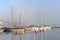 Yachts and boats in haze early morning