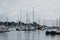 Yachts and boats moored in a marina in Lymington, New Forest, UK