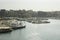 Yachts and boats stand on the pier in the port. Heraklion