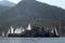 The yachts colored with spinnaker racing and passing behind the island in Marmaris, Turkey