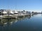 Yachts docked at a pier