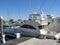 Yachts docked at a pier