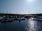 Yachts marina boats harbour pier rainbow reflections sunshine