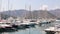 Yachts moored on a buoy in the marina on a summer evening