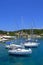 Yachts moored in crystal clear water