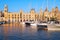 The yachts moored in the harbor in front of Malta Maritime Museum. Malta.