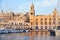 The yachts moored in the harbor in front of Malta Maritime Museum. Malta.