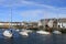 Yachts moored in Isle of Whithorn harbor Scotland