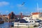 Yachts moored in the Motlawa in front of Zuraw Port Crane, Gdansk, Poland