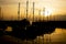 Yachts moored at Victoria Dock Marina at sunset in Caernarfon, Wales