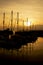 Yachts moored at Victoria Dock Marina at sunset in Caernarfon, Wales