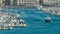 Yachts and motorboats leaving Marseille Vieux Port, busy water traffic timelapse