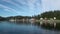 Yachts pier on background of landscape calm water of Pacific Ocean in Alaska.