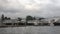 Yachts pier on background of landscape calm water of Pacific Ocean in Alaska.