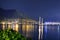 Yachts at the pier and beach in night illumination