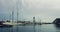 Yachts port, Barcelona, Spain. Sailboats in yacht marina under clouds sky