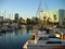 Yachts, Sailboats and Speedboats docked by Shoreline Village, Rainbow Harbor, Long Beach, California