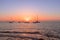 Yachts at sea during stunning sunset in Ibiza. Cala Comte, Balearic Islands. Spain