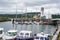 Yachts and Speedboats Moored in a Marina.