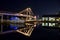 Yachts stay in doc. Night lights on the bridge in Toronto