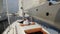 Yachtsman sleeping on deck of sailing yacht. Vacation, holiday