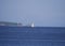 Yachtsmen travel on a wooden sailing yacht on the ocean Bay on a warm Sunny autumn day.