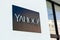 Yahoo! sign at the company HQ office. Yahoo! is an American web services provider owned by Verizon Media