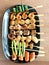 Yakitori: Japanese bite-sized food skewers: asparagus, sausage, scallop, squid, mushroom, prawns, chicken, pork, beef and okra