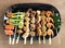 Yakitori: Japanese bite-sized food skewers: asparagus, sausage, scallop, squid, mushroom, prawns, chicken, pork, beef and okra